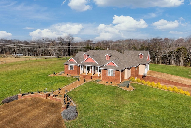 view of front facade with a garage and a front lawn