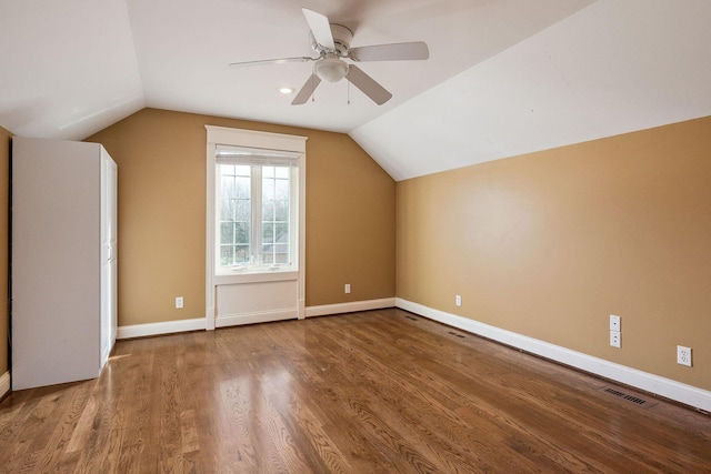 bonus room with hardwood / wood-style floors, ceiling fan, and lofted ceiling