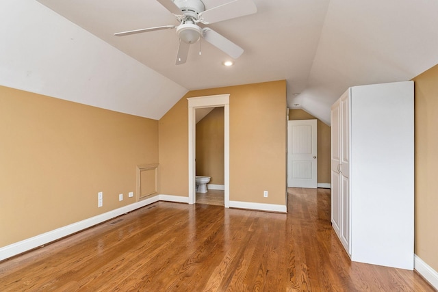 additional living space featuring ceiling fan, wood-type flooring, and lofted ceiling