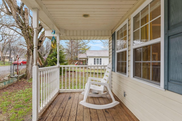 wooden deck featuring covered porch