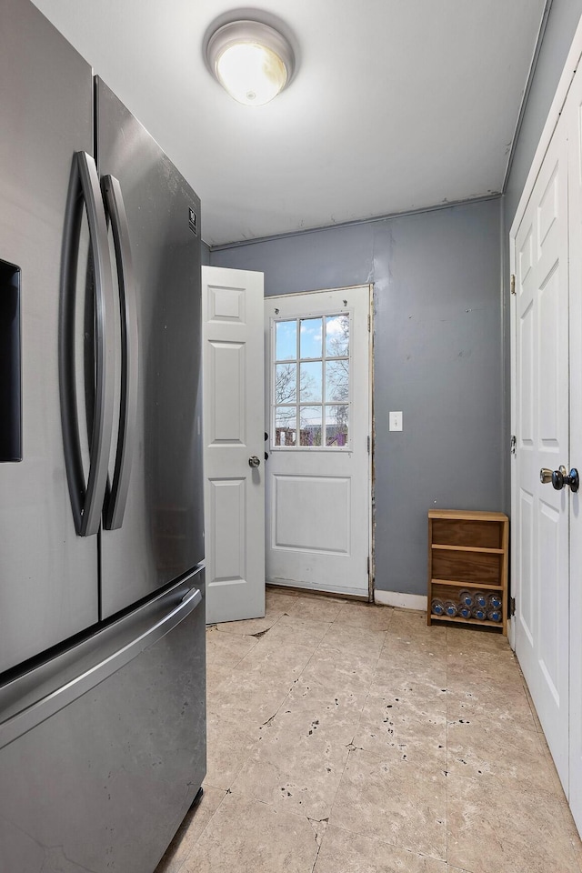 kitchen featuring stainless steel fridge