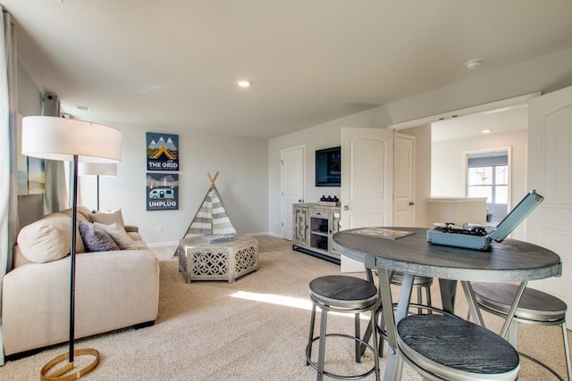 view of carpeted dining space