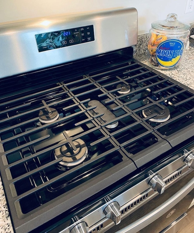 room details featuring stainless steel range with gas stovetop