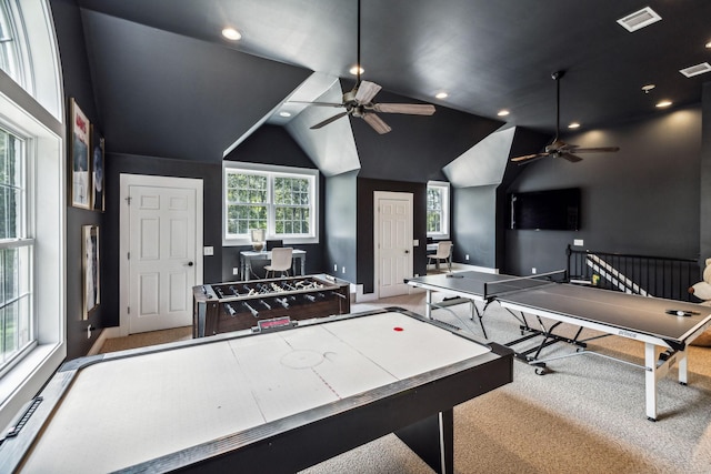 game room featuring ceiling fan, light colored carpet, and lofted ceiling