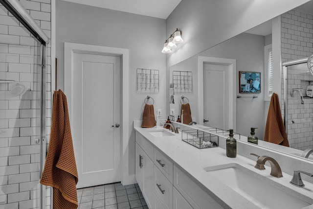 bathroom with vanity, tile patterned floors, and an enclosed shower