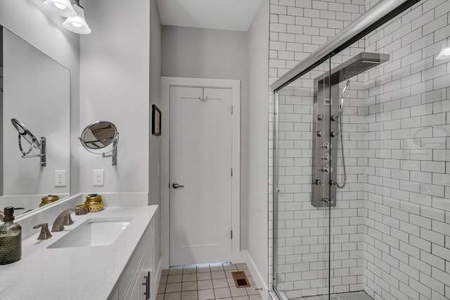 bathroom featuring vanity, tile patterned floors, and an enclosed shower