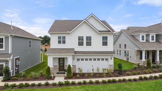 craftsman inspired home with a front lawn and a garage