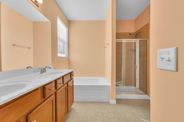 bathroom featuring vanity and shower with separate bathtub