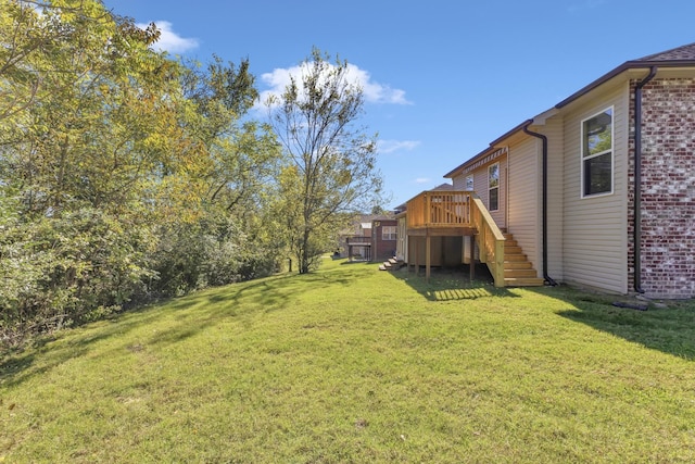 view of yard with a deck