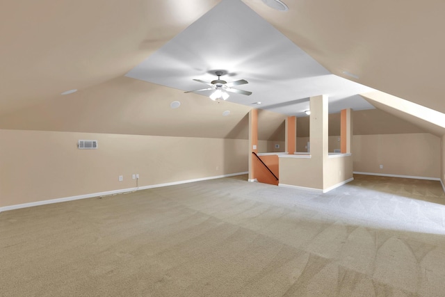 bonus room with carpet floors, ceiling fan, and lofted ceiling