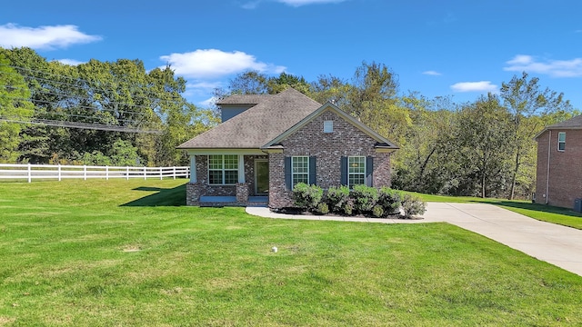 view of front of home with a front yard