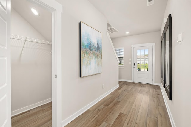 entrance foyer with light hardwood / wood-style floors