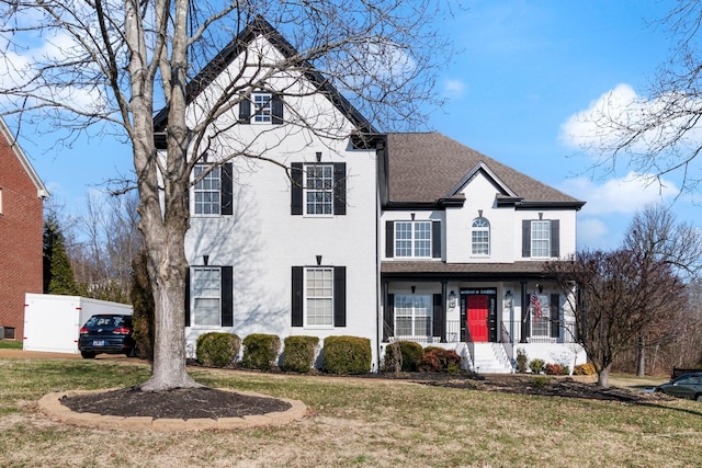 view of front of house with a front lawn