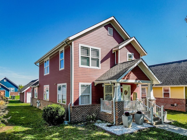 view of front of house featuring a front lawn