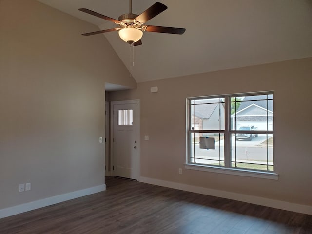 unfurnished living room with ceiling fan, dark hardwood / wood-style flooring, and high vaulted ceiling