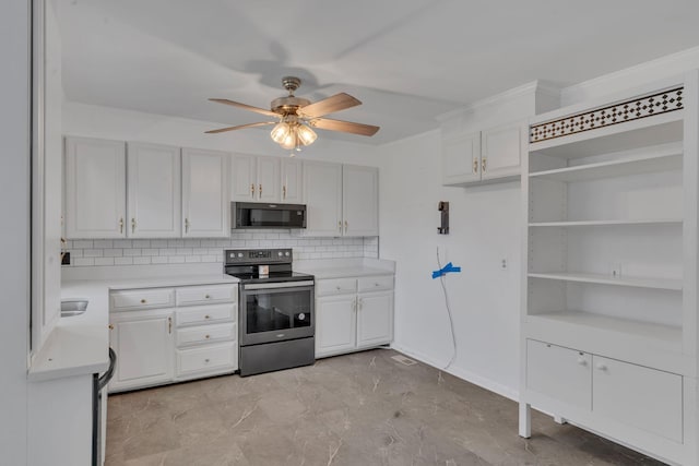 kitchen featuring backsplash, white cabinetry, ceiling fan, and stainless steel range with electric stovetop