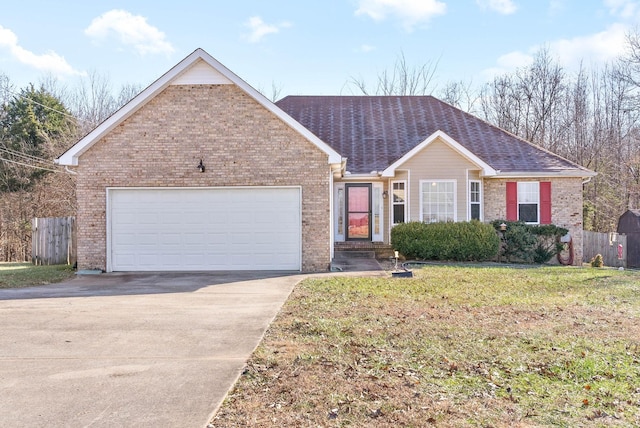 ranch-style house with a garage and a front lawn