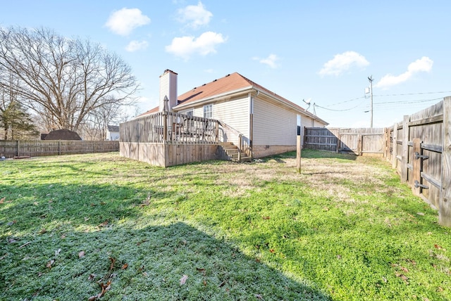 view of yard with a deck