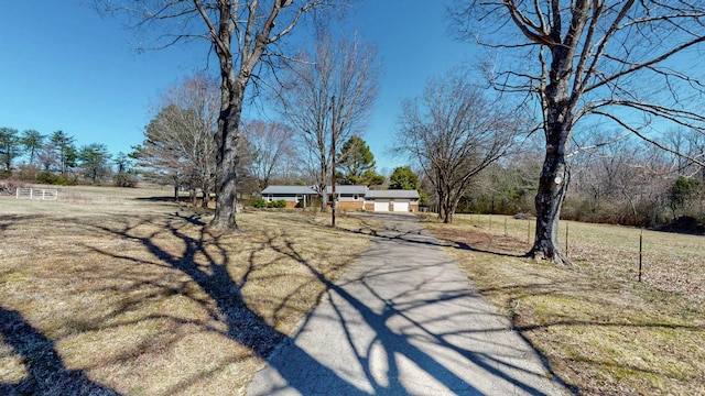 view of street featuring driveway