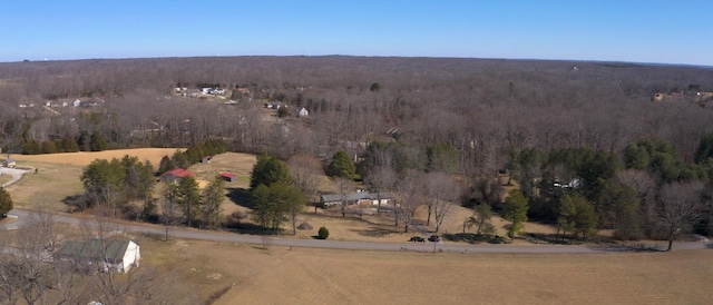 birds eye view of property with a rural view