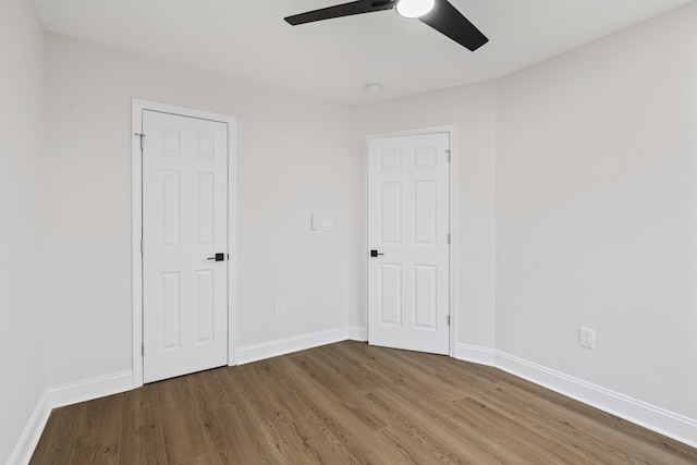 unfurnished room featuring wood-type flooring and ceiling fan