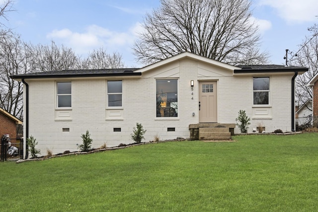 view of front facade with a front lawn