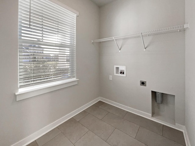 washroom featuring hookup for a washing machine, tile patterned floors, and electric dryer hookup