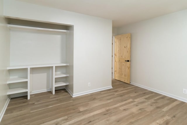 unfurnished bedroom featuring light hardwood / wood-style flooring