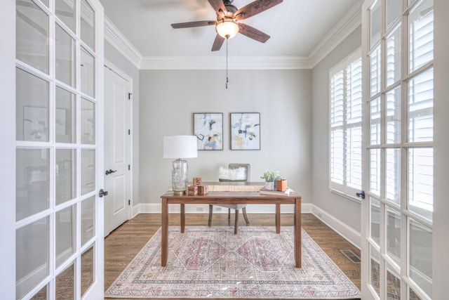 office area with french doors, dark hardwood / wood-style floors, ceiling fan, and ornamental molding