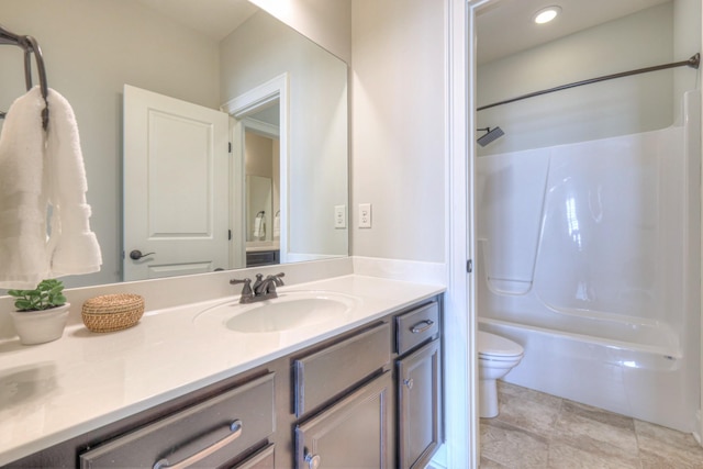 full bathroom with shower / bathing tub combination, vanity, and toilet