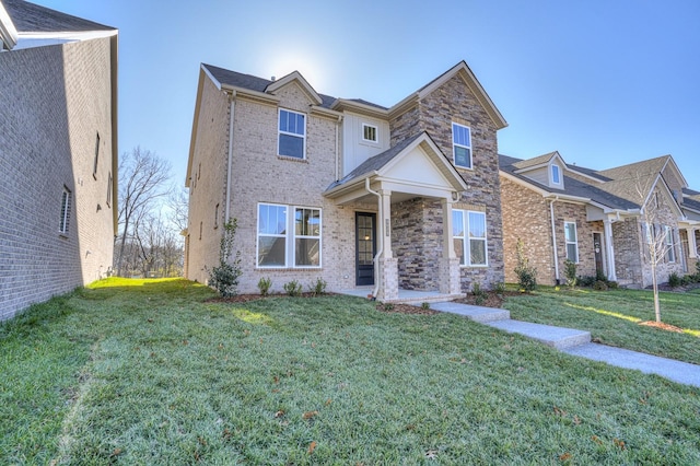 view of front of home featuring a front lawn