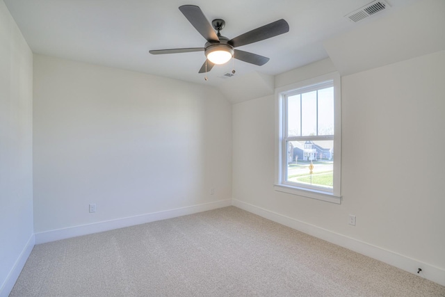 unfurnished room featuring ceiling fan and carpet floors