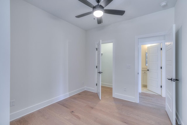 unfurnished bedroom with light wood-type flooring and ceiling fan