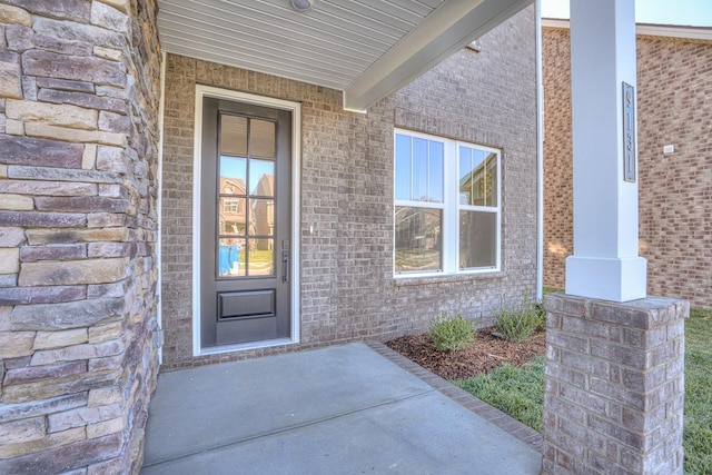 doorway to property featuring a porch