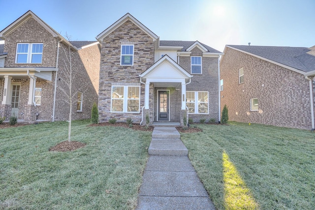 view of front of property featuring a front lawn