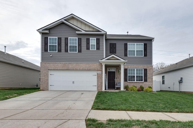 view of front of house featuring a garage and a front lawn