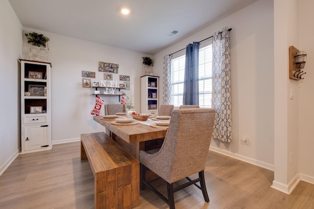 dining room featuring light hardwood / wood-style floors