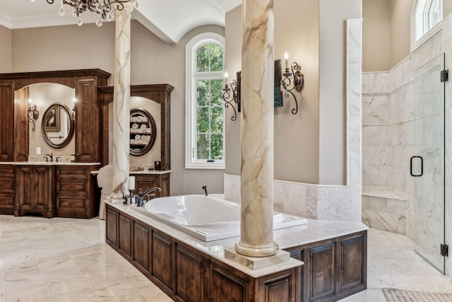 bathroom featuring vanity, crown molding, and independent shower and bath