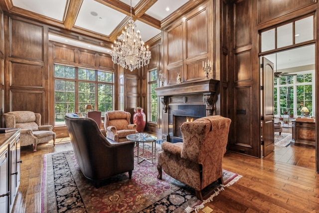 living room with wood walls, beamed ceiling, coffered ceiling, and hardwood / wood-style flooring