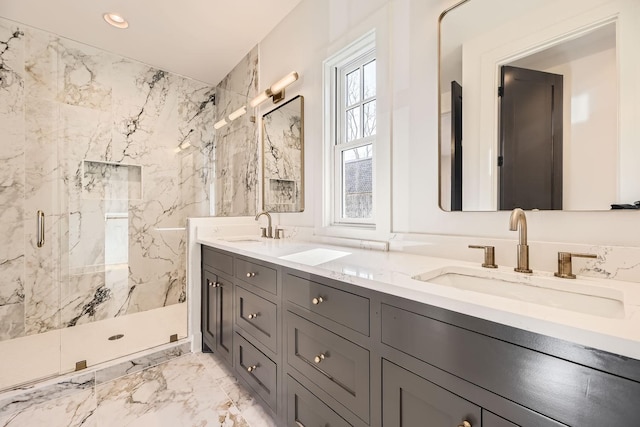 bathroom with vanity and an enclosed shower