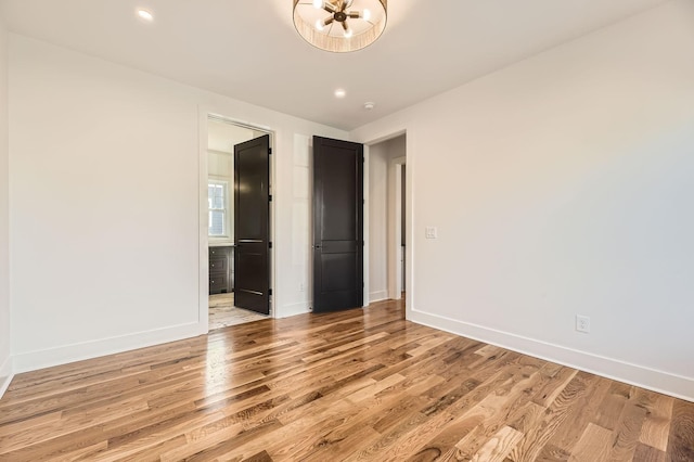 unfurnished bedroom with light hardwood / wood-style flooring