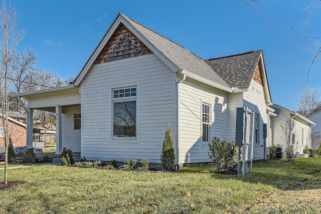 view of home's exterior featuring a lawn