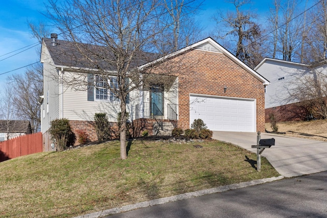 view of front facade with a front yard and a garage