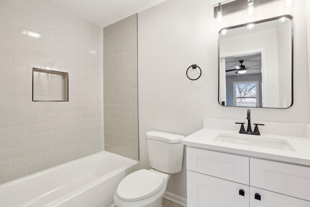 full bathroom featuring ceiling fan, vanity, tub / shower combination, and toilet