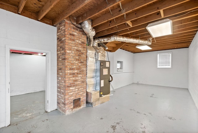basement featuring heating unit