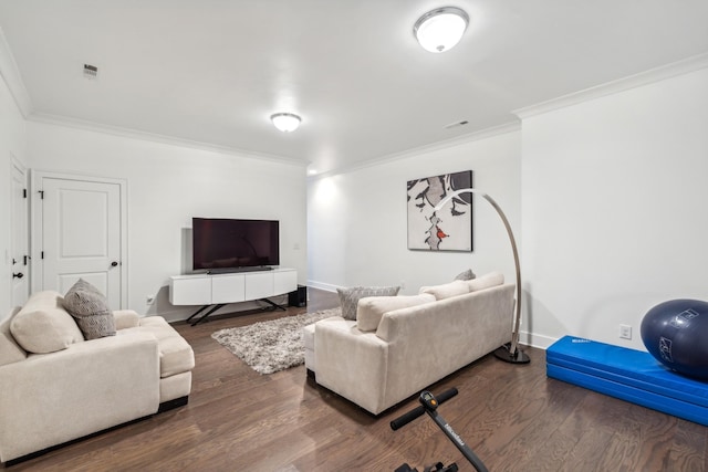 living room with crown molding and hardwood / wood-style flooring