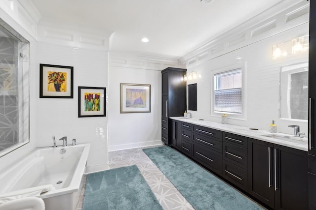 bathroom featuring crown molding, tile patterned flooring, vanity, and a bath