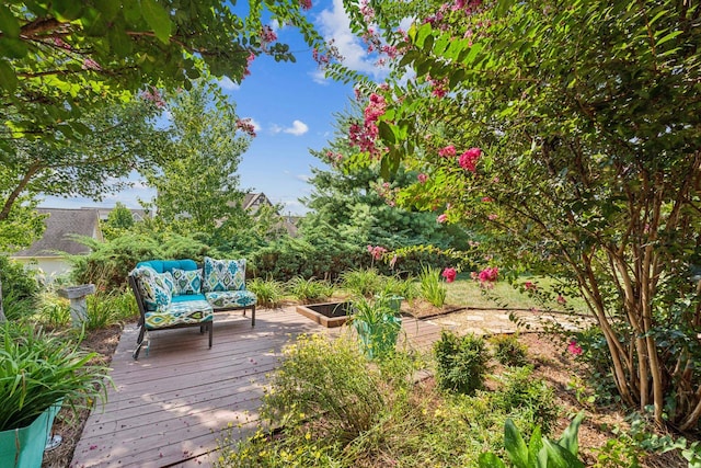 deck featuring outdoor lounge area