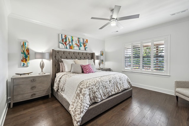 bedroom with ceiling fan, dark hardwood / wood-style floors, and ornamental molding