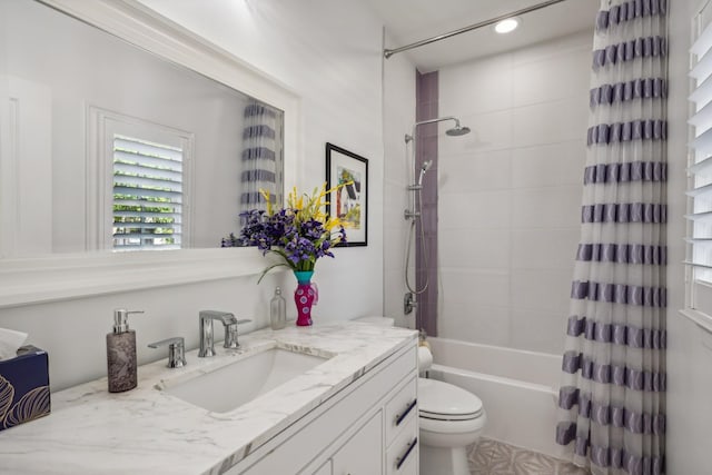 full bathroom with vanity, toilet, and shower / bath combo with shower curtain